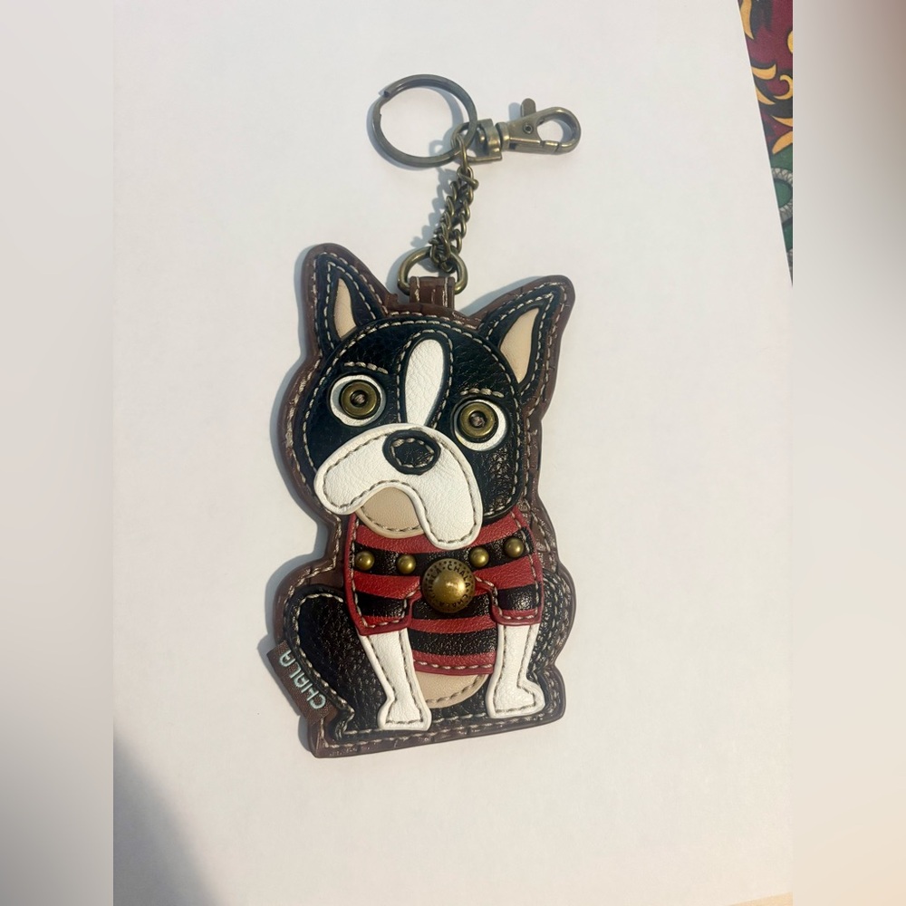 Chala dog key chain card holder.
Never used.
No tags